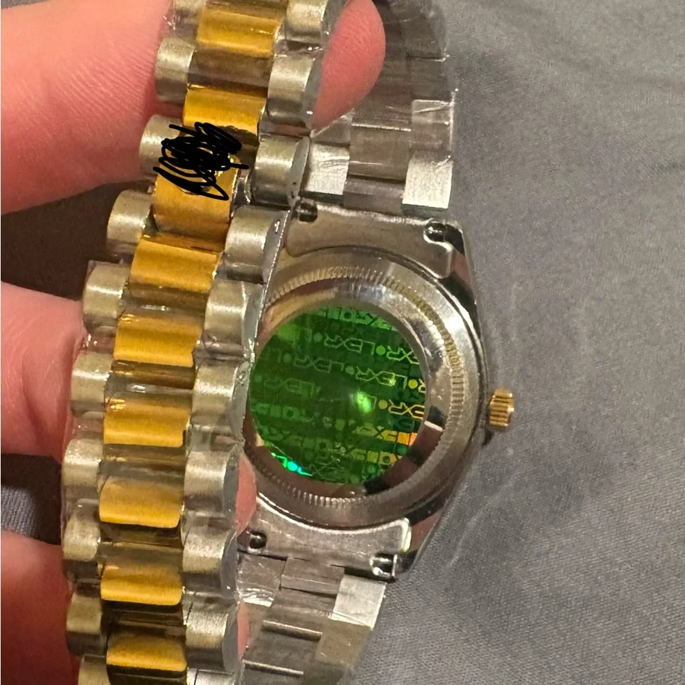 Red and Gold Watch with Moissanite Diamonds around the face